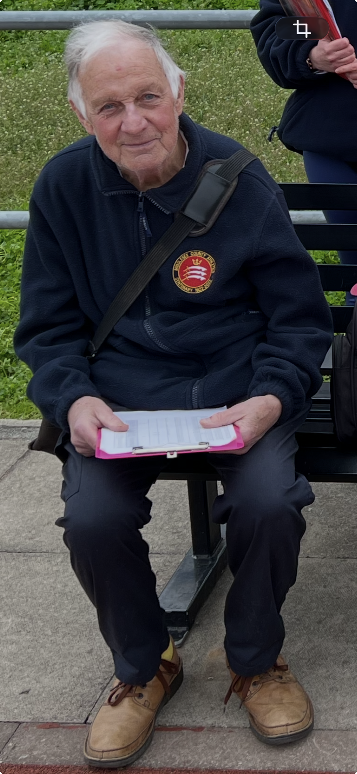 Ivor sat on a bench at the county championships.